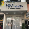 Bảng hiệu tấm xi măng - HM Studio